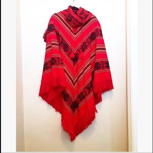 Red poncho cape.